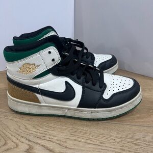 Air Jordan Black and White Sneakers with Gold Accent